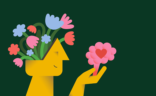 Human head with flowers. Hand holding human brain. Mental wellbeing and self care concept. Editable vectors on layers.