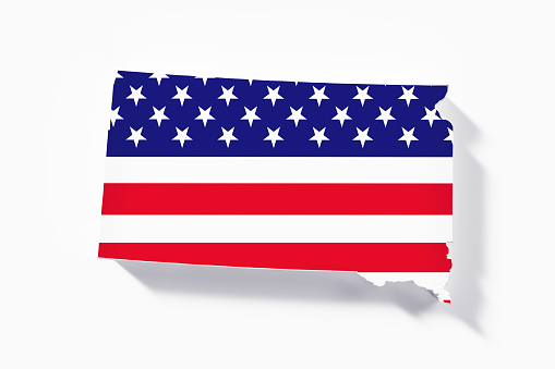 State border of South Dakota textured with American flag on white background. Horizontal composition with copy space.