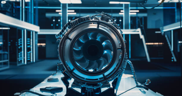 istock Advanced Futuristic Turbine Engine with a Moving Fan. Modern Industrial Jet Engine in Research and Development Facility. Zoom In Close Up on a Turbofan Engine 1489394498