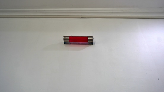 Bonpet a light fire extinguisher attached to the wall contains a chemical liquid that can turn into nitrogen gas if it is hot