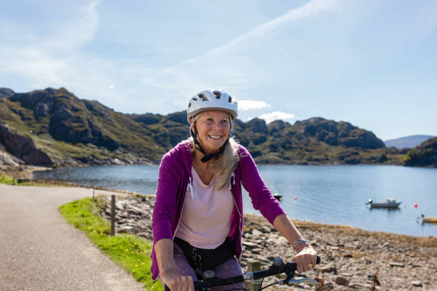 istock Exercising on her Bike 1489401625