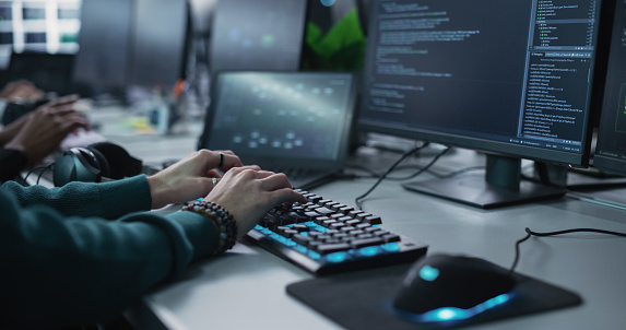 Close Up Of A Software Developer Working On A Desktop Computer ...