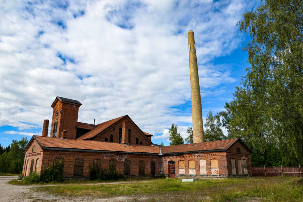 istock View of old abandoned industry building against cloudy sky 1489407567