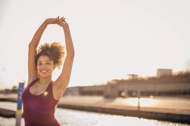istock Woman exercising outdoors 1489409967