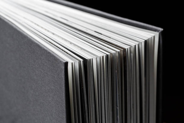 istock Corners of a black textile book cover close up. 1489414338