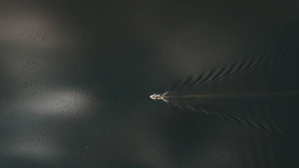 istock Solitary boat adrift in a serene lake. 1489416904