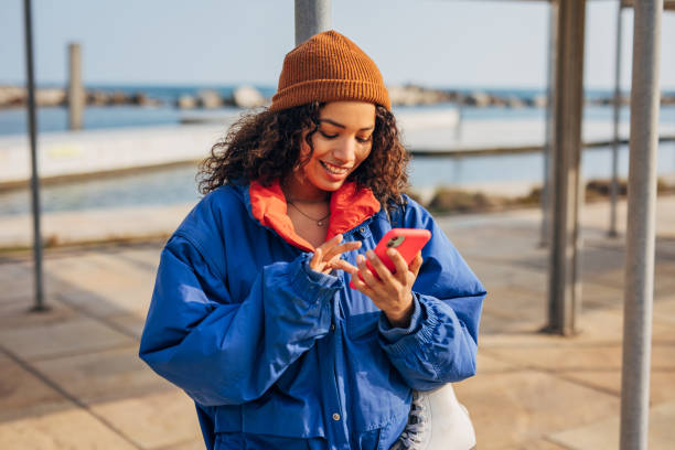 istock Woman using smart phone 1489418796