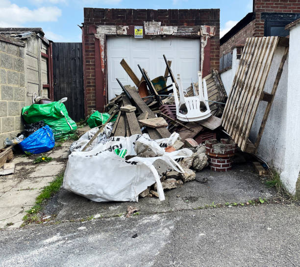 istock Fly tipping in front of an old garage 1489419816