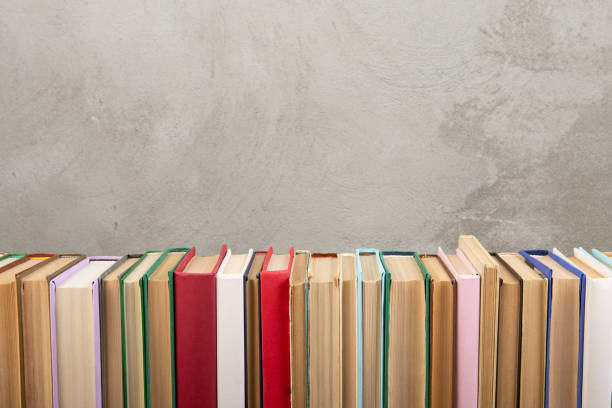 istock Books background for wisdom, science and education. Reading and writing concept 1489421260