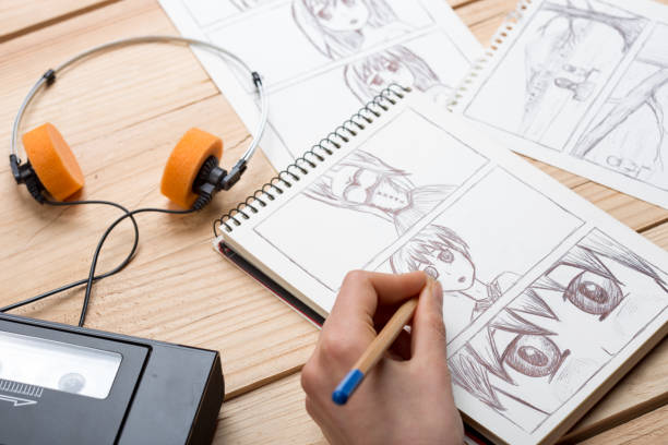 istock Artist drawing an anime comic book in a studio. 1489423239