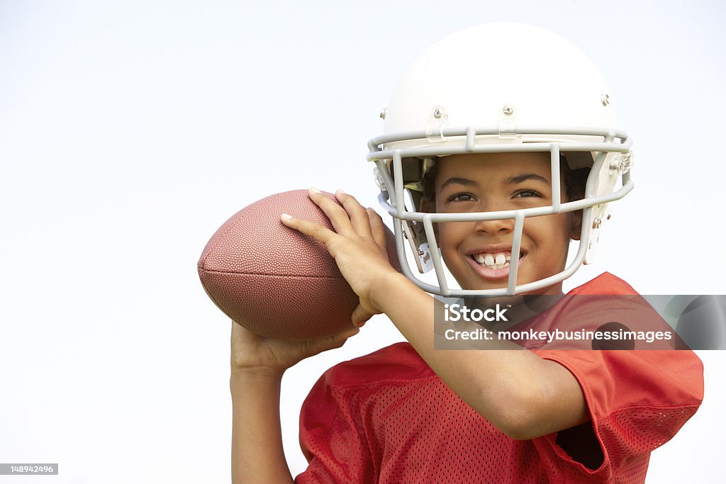 Jovem rapaz jogar futebol americano - Royalty-free Futebol Americano Foto de stock