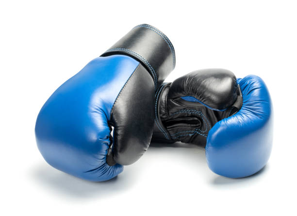istock Blue and black boxing gloves isolated on a white background 1489426670