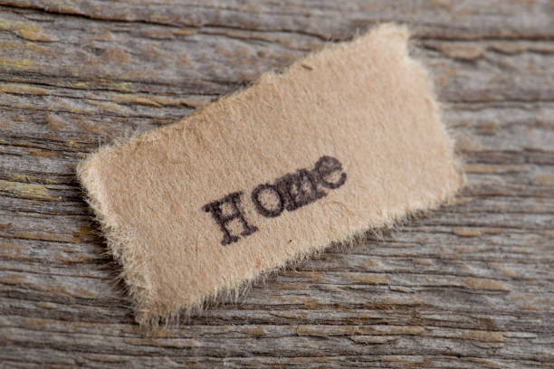 istock Home typed text on a paper, real estate concept 1489427666