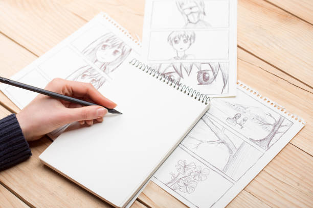 istock Artist drawing an anime comic book in a studio. 1489429092