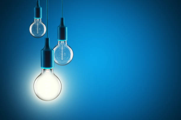 istock Idea and leadership concept - bulbs on the blue background 1489430262