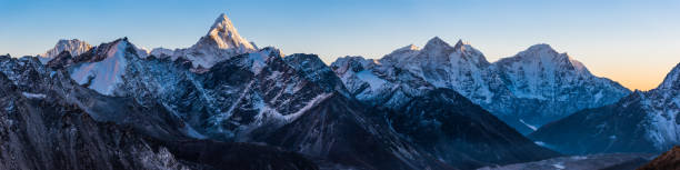 istock Sunset light illuminating dramatic snowy peaks glaciers Himalayas panorama Nepal 1489430339