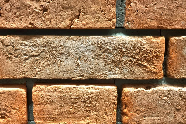istock Texture of a brick wall, red bricks background. 1489430395