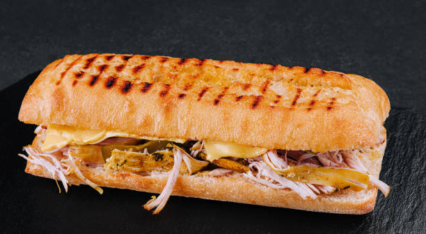 istock Big sandwich with chicken on stone board 1489431288