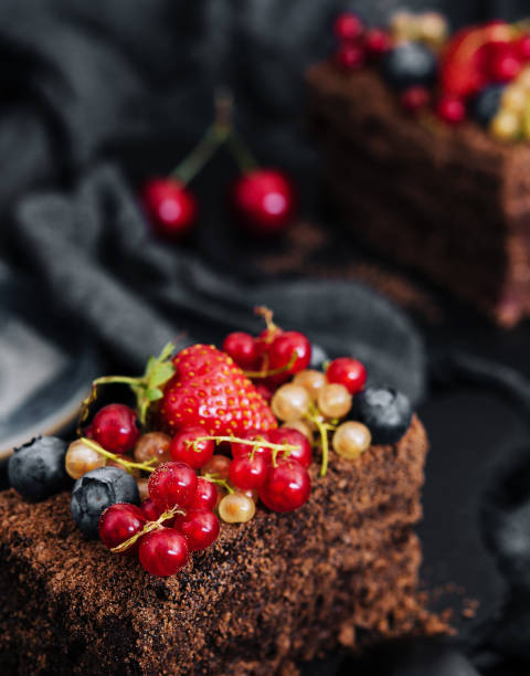 istock Delicious chocolate cake decorated with fresh berries 1489431304
