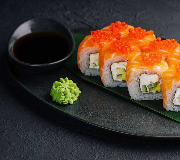 istock Philadelphia Sushi with avocado on black dish 1489431536