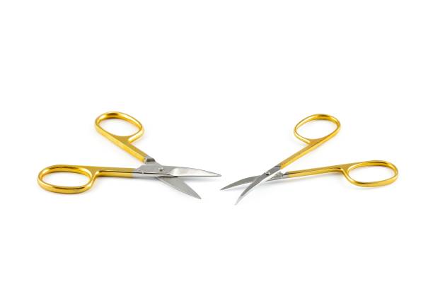 istock Gold silver metal nail scissors. 1489431882