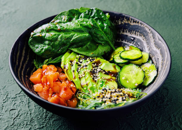 istock poke bowl with salmon, avocado and cucumber 1489433961