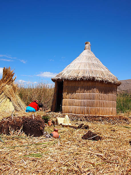 istock A straw roof clay hut on floating Uros island 148944459