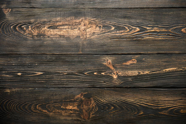 istock Dark brown wood background 1489445595