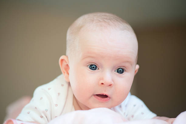 istock 2-3 months old beautiful baby 148944763