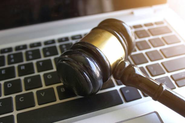istock Selective focus image of judge gavel and keyboard. 1489447830
