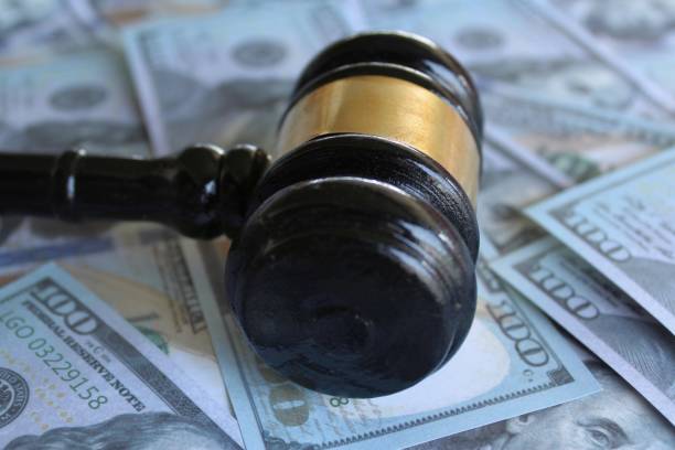 istock Judge gavel and money 1489447831