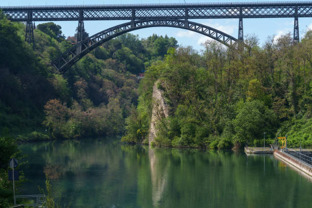 istock Iron bridge over Adda river at Paderno 1489451147