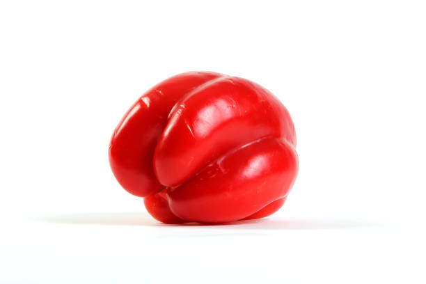Red paprika on a white background.
