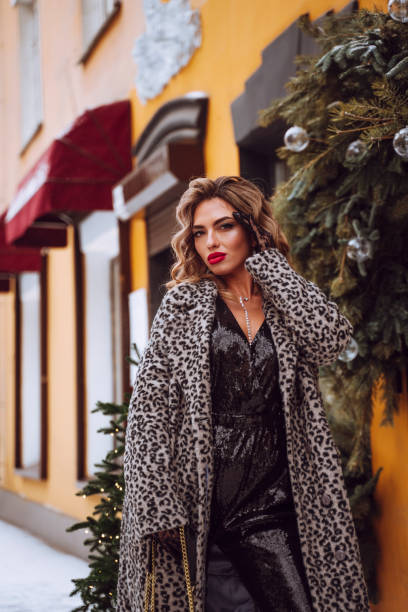 istock Fashionable woman outdoors in winter 1489456536