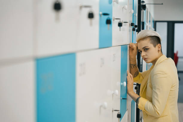 istock Sad woman looking at camera in the office 1489459116