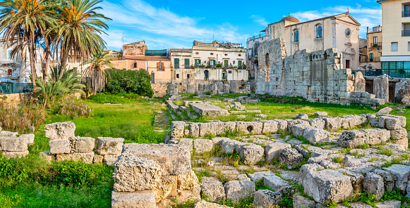 Panoramic view to ancient Doric Temple of Apollo in Ortigia island. Syracuse, Sicily, Italy