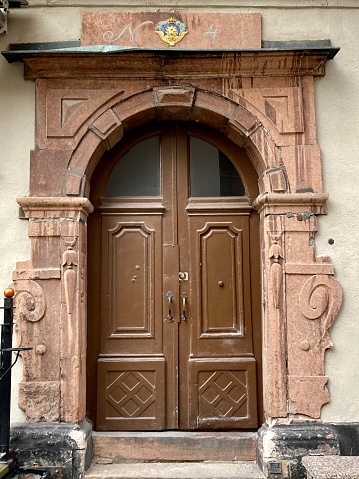 Sweden - Stockholm - little street in the old town - ancient door