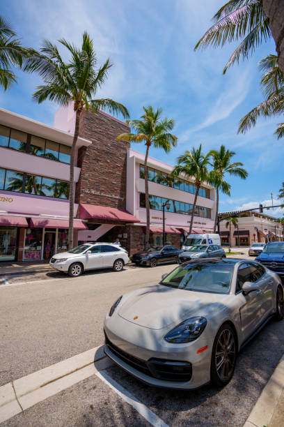 Upsacale shops at The Worth Avenue Building Palm Beach Palm Beach, FL, USA - May 11, 2023: Upsacale shops at The Worth Avenue Building Palm Beach Exotic Car Rentals Elevate Your USA Tourist Experience stock pictures, royalty-free photos & images