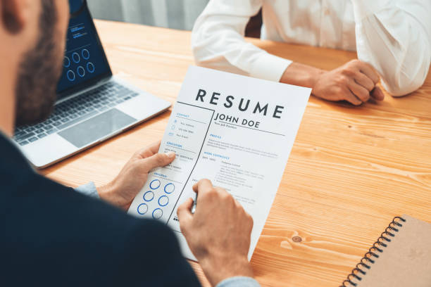 istock Job candidate engaging conversation with interviewer during job interview. Entity 1489467560