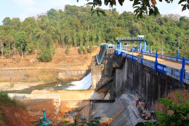 istock construction workers do maintenance at peruvannamuzhi (peruvannamoozhi) dam, Kerala, India, Kuttyady (Kuttiady, Kuttyadi) 1489469584