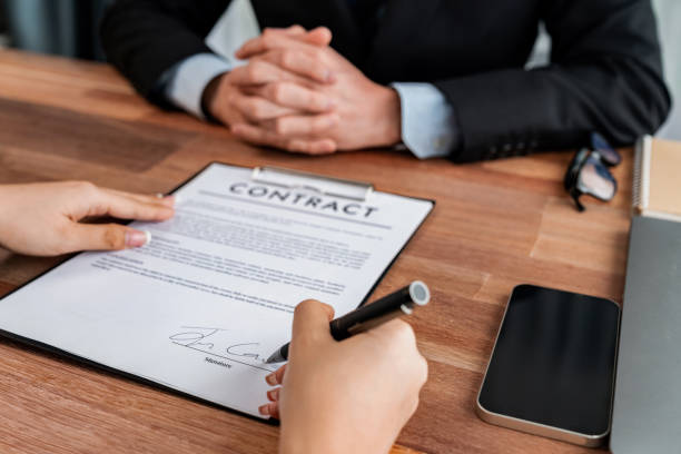 istock Successful agreement between two business partnership with signature. Jubilant 1489472034