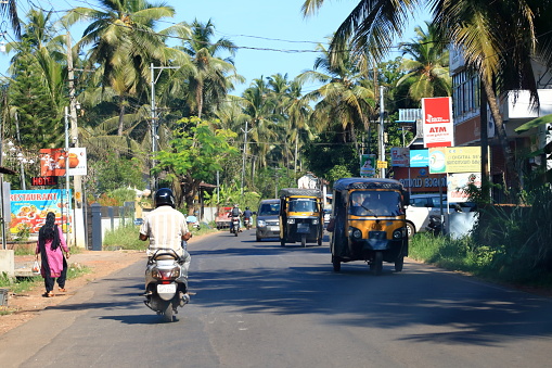 December 29 2022 - Kannur district, Kerala in India: Indian Traffic on dusty streets