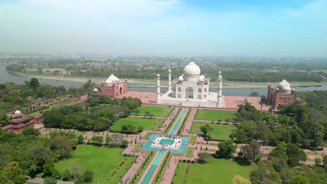 Taj Mahal, India: Aerial view of of iconic monument in city Agra (Uttar Pradesh), famous marble mausoleum on right bank of river Yamuna - landscape panorama of South Asia from above