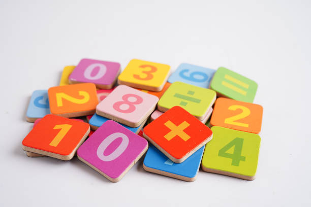 istock Number wood block cubes for learning Mathematic, education math concept. 1489474200