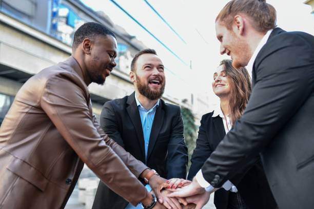 istock Business Team Huddling To Boost Team Spirit 1489475736