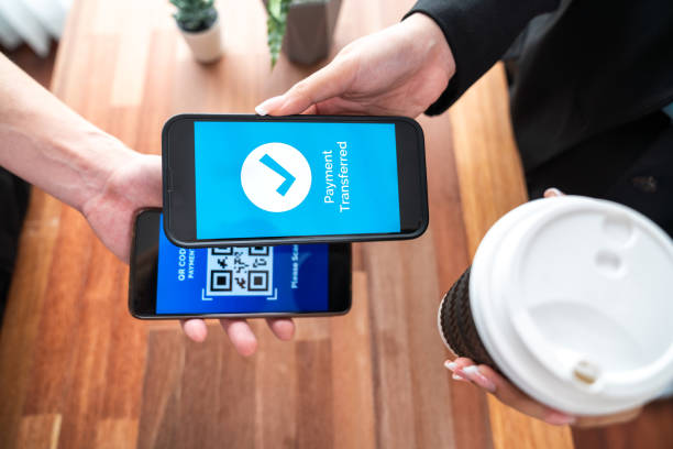 istock Seamless cashless payments with barcode scanning on smartphone app. Jubilant 1489476158