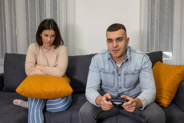 istock Young couple suffers from computer games addiction 1489485179