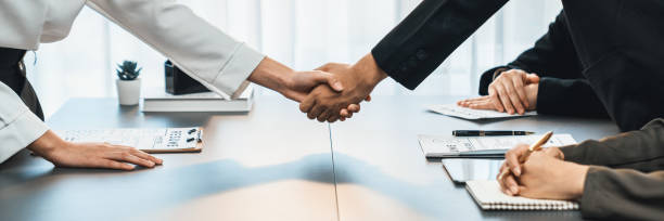istock Successful job interview at business office end with handshake. Prodigy 1489485209
