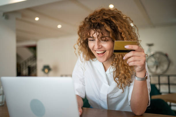 istock I enjoy shopping online while drinking coffee in a cafe 1489488446