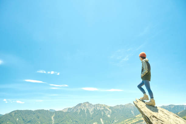 istock Hiker on the top of the mountain peak. 1489494319